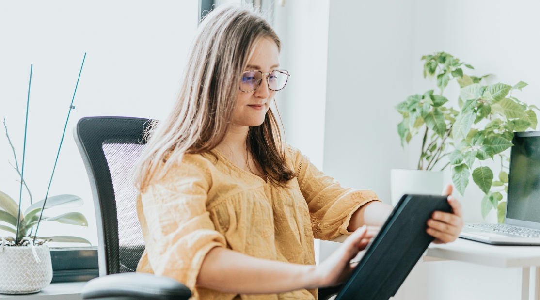 Young girl looking at a tablet